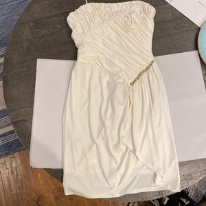 Short ivory special occasion dress, Size 4. beaded accent on pleated front.